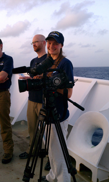 Tara manning the video camera onboard the NOAA Ship Okeanos Explorer.