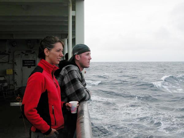 Carey and Patrick scan the horizon in the Gulf of Alaska.