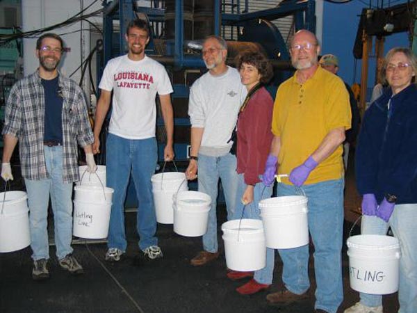 Ready and waiting for action the members of the bucket brigade.