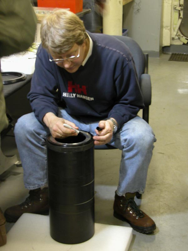 Chris Nicholson repairs a leak in the High Definition camera housing by re-sealing the dome.
