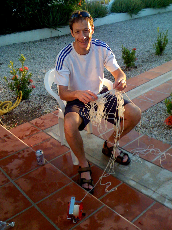 Jim works on untangling a low tech device
