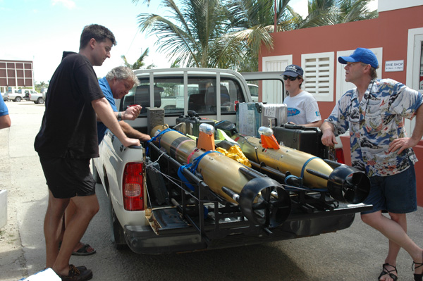 AUVs are loaded into the back of a pickup truck 