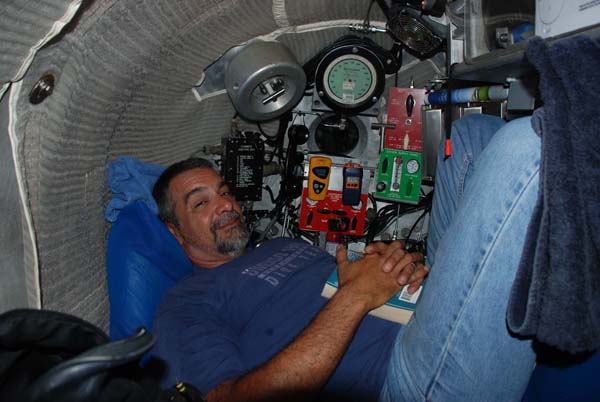 Johnson Sea Link pilot, Frank Lombardo, shown in the aft chamber of the Johnson
Sea Link submersible.