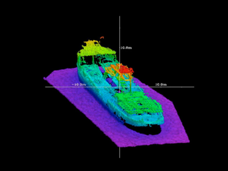 Multibeam bathymetric image of the King George shipwreck in Bermuda color coded with depth such that the warmer colors (red, orange, etc.) represent shallower depths, while the colder colors (purple) correspond to deeper depths. This dredge ship was intentionally sunk in 18 m water depths of the north lagoon in 1930.