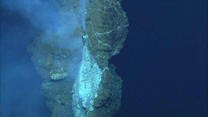 A hot vent (255 degrees C) near the top of a 38-m-high sulfide chimney in the Loloa Kakai vent field.