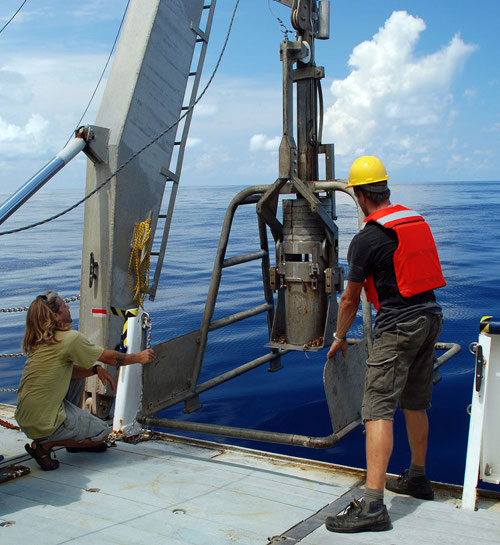 The NIOZ boxcore being recovered off the starboard side of the ship to collect deep-sea sediment.