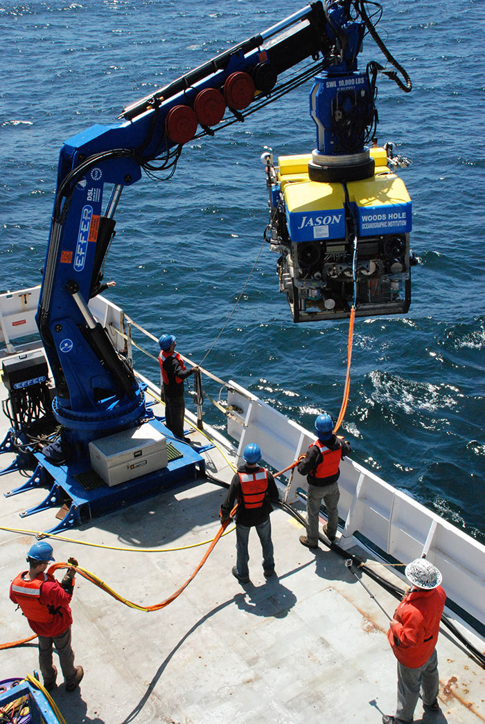 The Woods Hole crew hoists Jason into the water for its first dive on Norfolk Canyon.