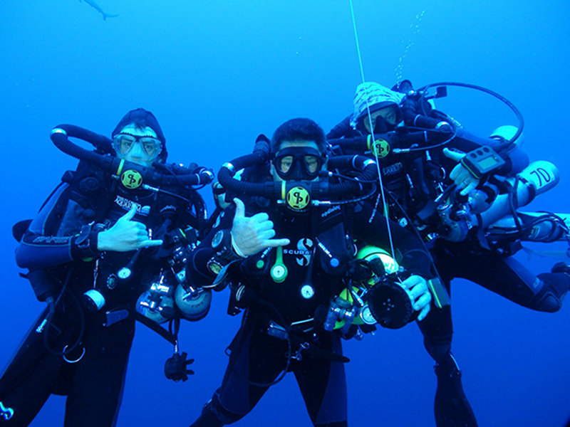 The technical dive team during an in-water decompression stop.