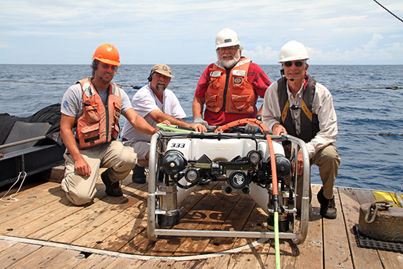 The UNCW Undersea Vehicles team with cruise Chief Scientist Dennis Hanisak