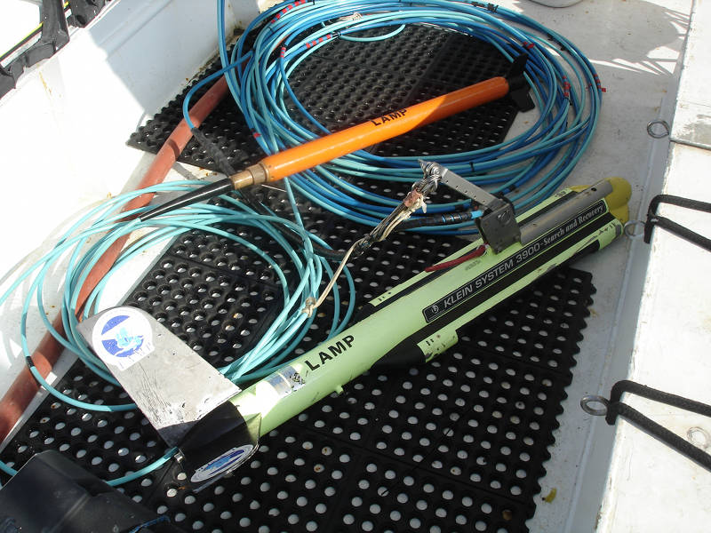 The orange magnetometer tow fish (above) and the side scan sonar tow fish (below). 
