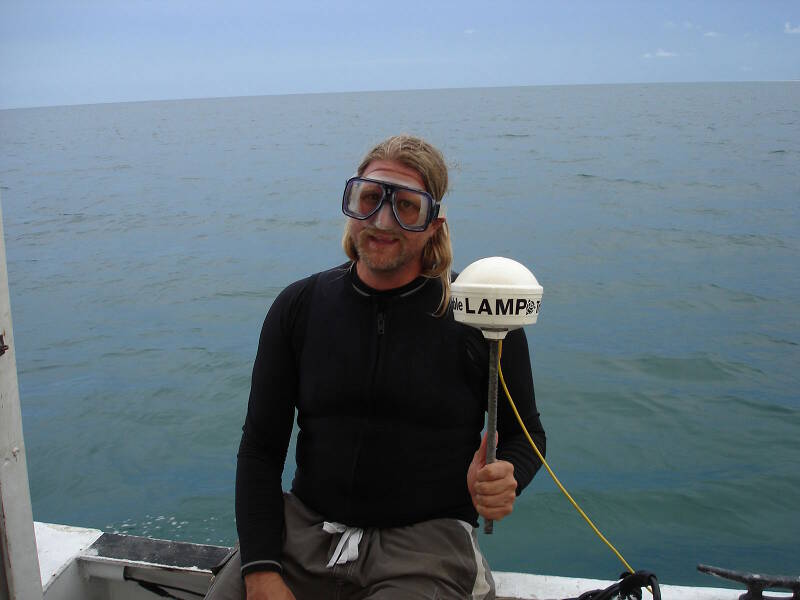 Chuck holding our survey GPS antennae. It is a highly accurate unit, precise to within one meter.