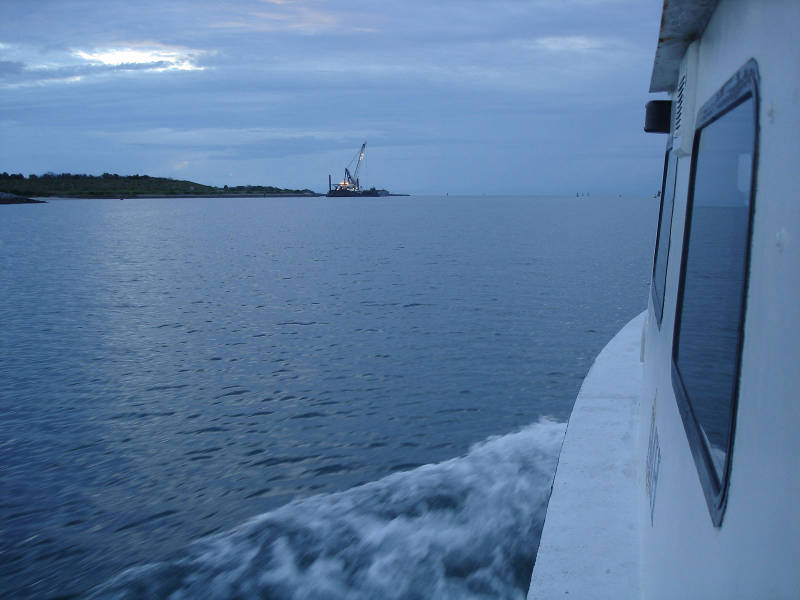 The research vessel Roper heads out to sea at dawn.