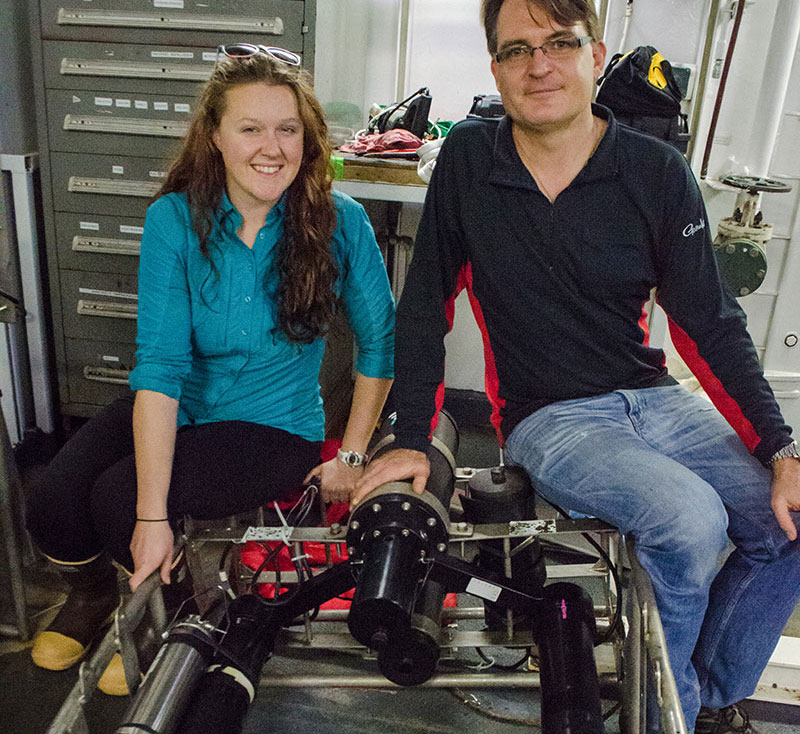 Jessica Pretty and Dr. Dhugal Lindsay sit with the VPR, which is a large and heavy instrument that gets attached to the CTD rosette.