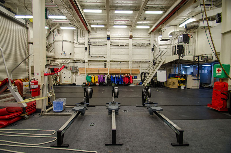 The helicopter hangar is used as a space for activities such as Crossfit, yoga, and morale events.