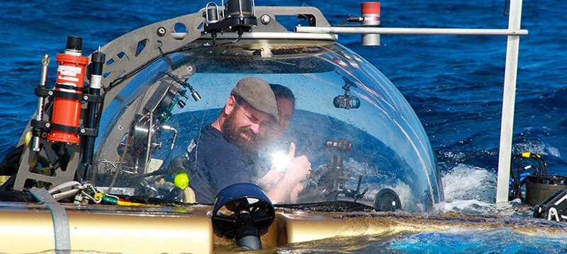 Archaeologist Joe Hoyt returns to the surface after a successful dive.