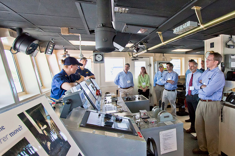 NOAA Corps officers on NOAA Ship Okeanos Explorer discuss operations with federal and state scientists and managers.