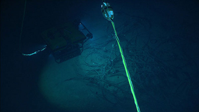Image from Seirios showing Little Hercules over the pile of wire cable.