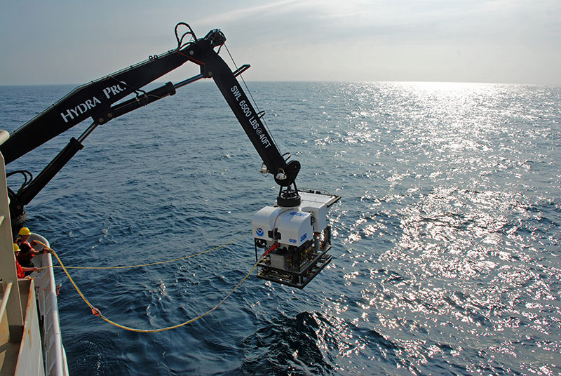 NOAA's new deepwater remotely operated vehicle, Deep Discoverer (D2), is deployed off the fantail of the ship for the first dive of the expedition.