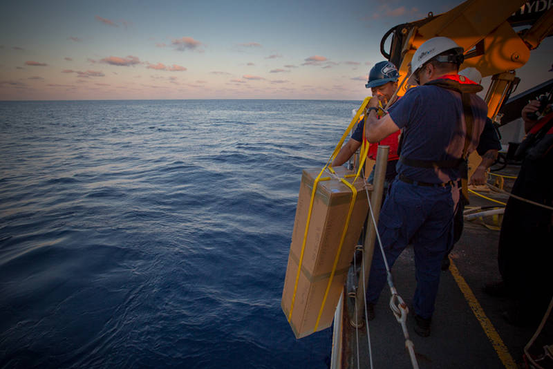 Okeanos Explorer crew members prepare to deploy the Argo float in the Gulf of Mexico.