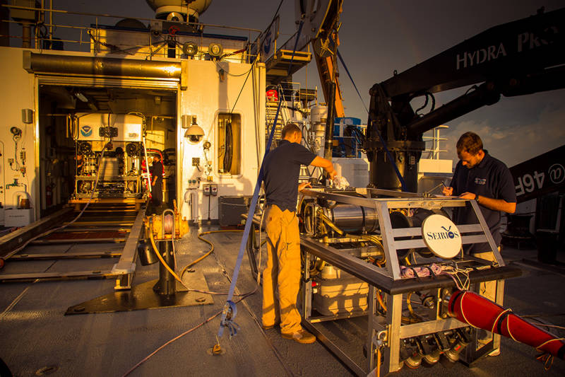 ROV team members  do maintenance on camera platform Seirios.