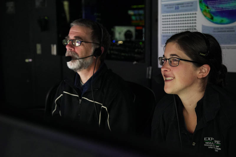 Scott France and Mackenzie Gerringer in the control room onboard NOAA Ship Okeanos Explorer.
