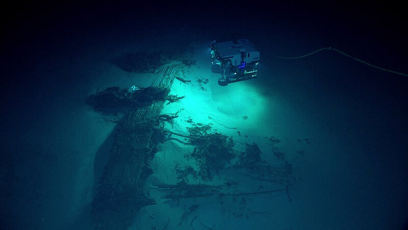 ROV Deep Discoverer discovers a B-29 Superfortress resting upsidedown on the seafloor.