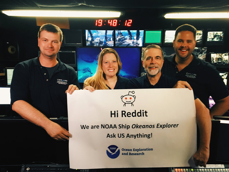 The Science Team aboard NOAA Ship Okeanos Explorer (Del, Kasey, Scott, and Mike, from left to right) prepares for the Reddit “Ask Me Anything” session.