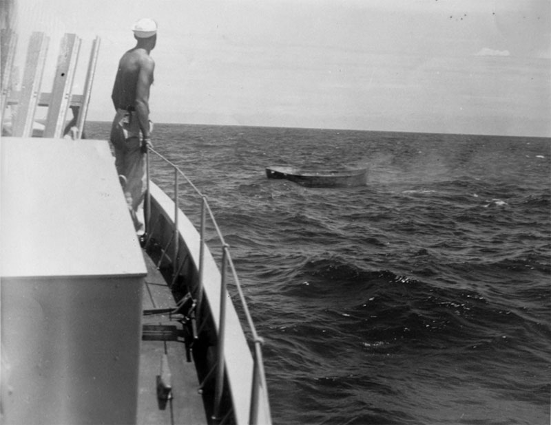 All of the survivors from the attack on the Bloody Marsh were rescued later in the morning by the Submarine Chaser (SC) 1049A. Here a crew member watches one of the lifeboats.