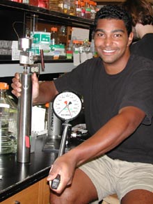 David Allen, holding a pressure vessel and hand pump