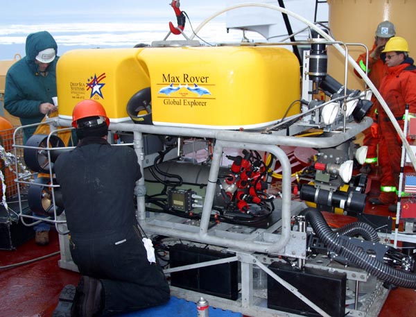 Technicians make final adjustments to the Global Explorer ROV