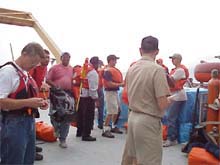Crew, officers, and scientific party during an abandon ship drill.