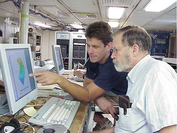 Mike Hoshlyk working with scientist Jim Robb