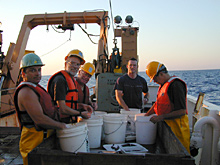 Sorting animals from the trawl catch at Bear Seamount in 2002. From left to right: Dr Tracey Sutton, Dr Jon Moore, Edward McChain, Chris Kenaly, Dr Michael Vecchione.