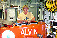Educator Specialist Margaret Olsen on top of the DSV Alvin
