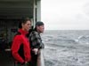 Carey and Patrick scan the horizon in the Gulf of Alaska