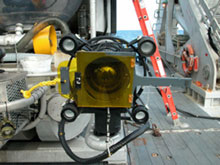 Photograph of four 400W HMI lights mounted on the submersible work basket.