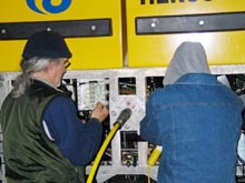 IFE ROV technicians/pilots work to disconnect the fiberoptic cable from Hercules.