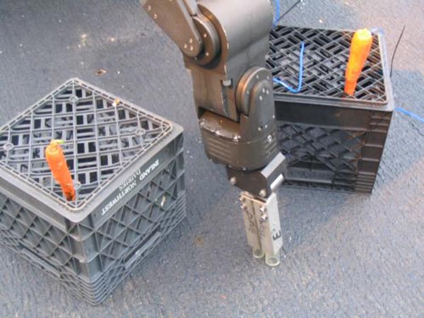 Testing the new claw using simulated seabed assembled with milk crates and carrots.