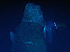 Blue-white glow of the Poseidon in the lights of the ROV Hercules