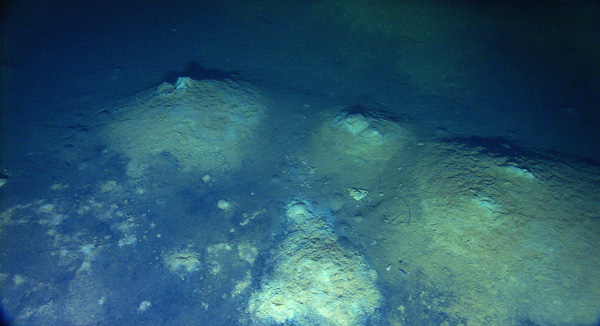 Low temperature hydrothermal mounds