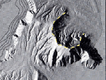The prominent horse-shoe shaped scar (dashed yellow line) in the Profitis Ilias