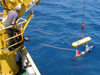 The SeaBED AUV is deployed over R/V Aegaeo's port side.
