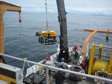 The Canadian remotely-operated-vehicle ROPOS is launched from the deck of the McArthur II as another dive operation begins.