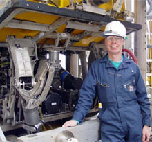 Mark Benfield aboard the Drill Ship Discoverer Enterprise with an Oceaneering Millenium Class ROV.