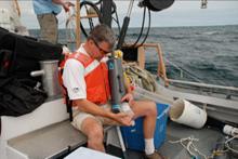 Steve Nold emptying groundwater collected from the bottom of the Middle 
Island Sinkhole
