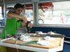 CSUMB Graduate Student Katie Glitz installs computer platforms on the scientific lab tables inside the Endurance.