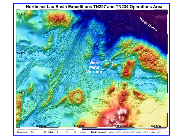 The West Mata Volcano, encircled by a white ellipse on this bathymetric map, is not the largest volcano in the northeast Lau Basin, but appears to be the most active.  This map represents the area visited and mapped on two recent expeditions to the area. The summit of West Mata Volcano is nearly one mile deep the base is nearly two miles deep. The Tonga Trench to the north and east of the expedition area is nearly seven miles deep.  Map courtesy of NOAA.
