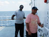 Seamen Frank Footman and Roberto Mendez (left to right) painting the deck to help keep the Ron Brown in top condition.