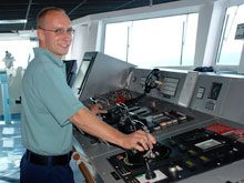 Officer John Rossi on the bridge piloting the NOAA ship Ronald H. Brown.
