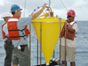 Crew of the RV Ron Brown deploying sediment trap. 